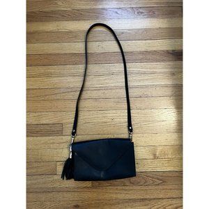 Sleek Black Crossbody Bag with Tassel Detail